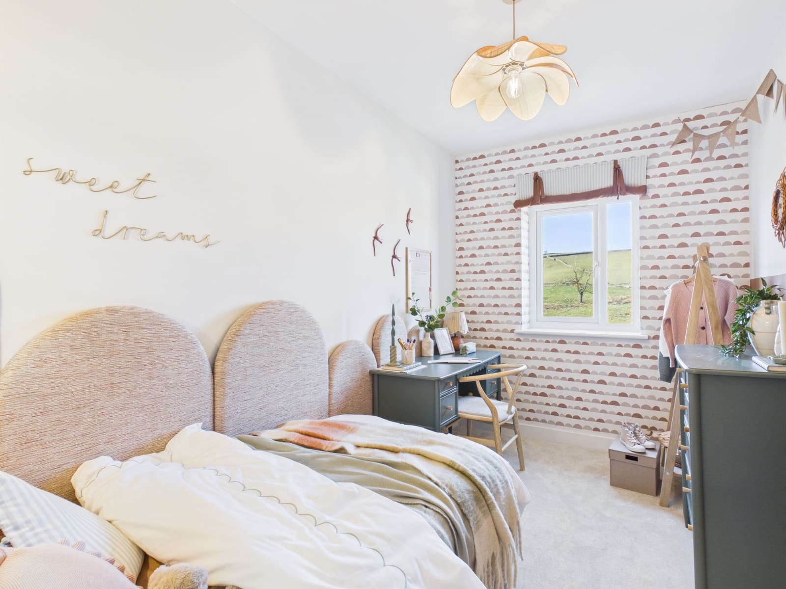 Show home bedroom styled in blush pink