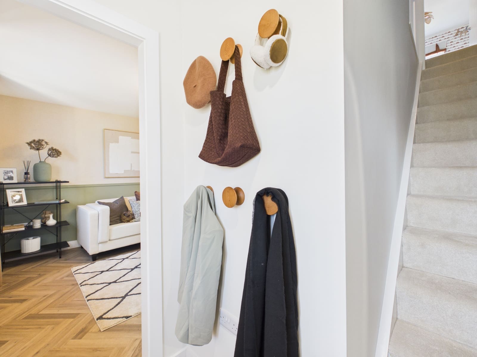 Show home entrance hallway with coat hooks